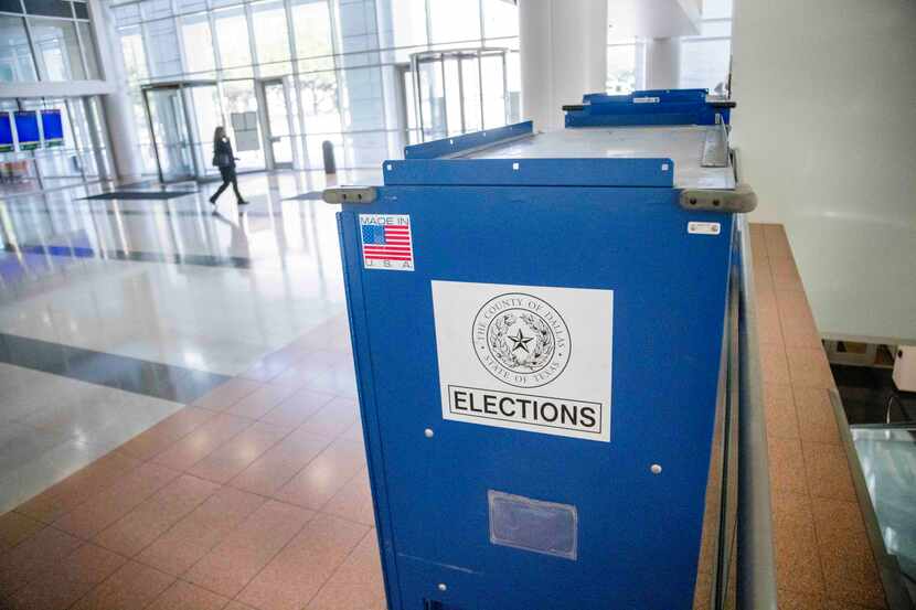 Equipment belonging to the Dallas County Elections office sits in the lobby of the George...