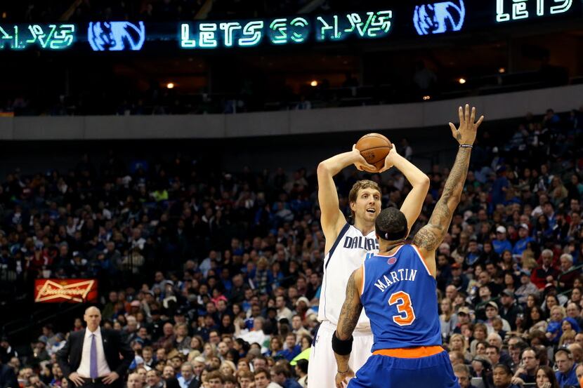 Dallas Mavericks power forward Dirk Nowitzki (41) looks to shoot over New York Knicks power...