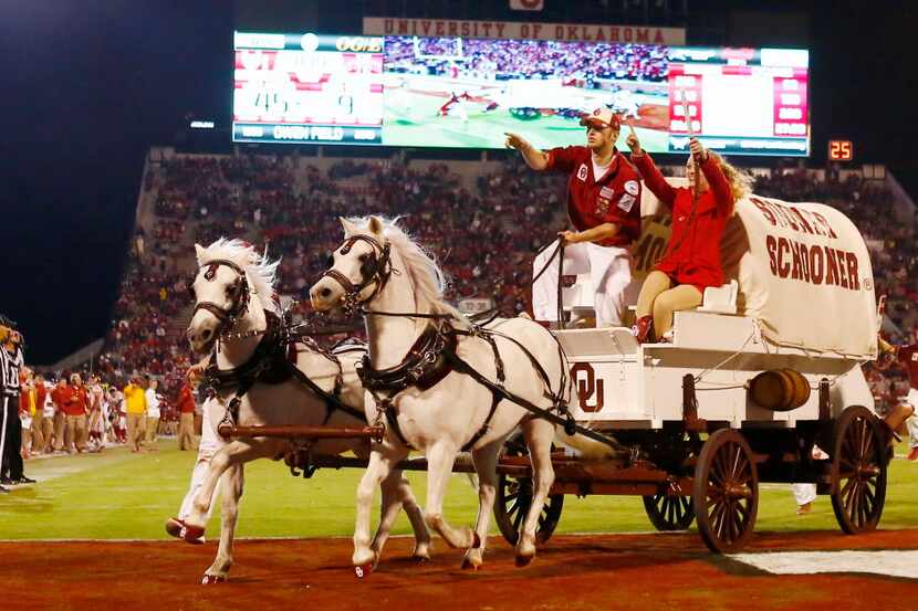 The Oklahoma Sooner Schooner runs after an Oklahoma touchdown against Iowa State during the...