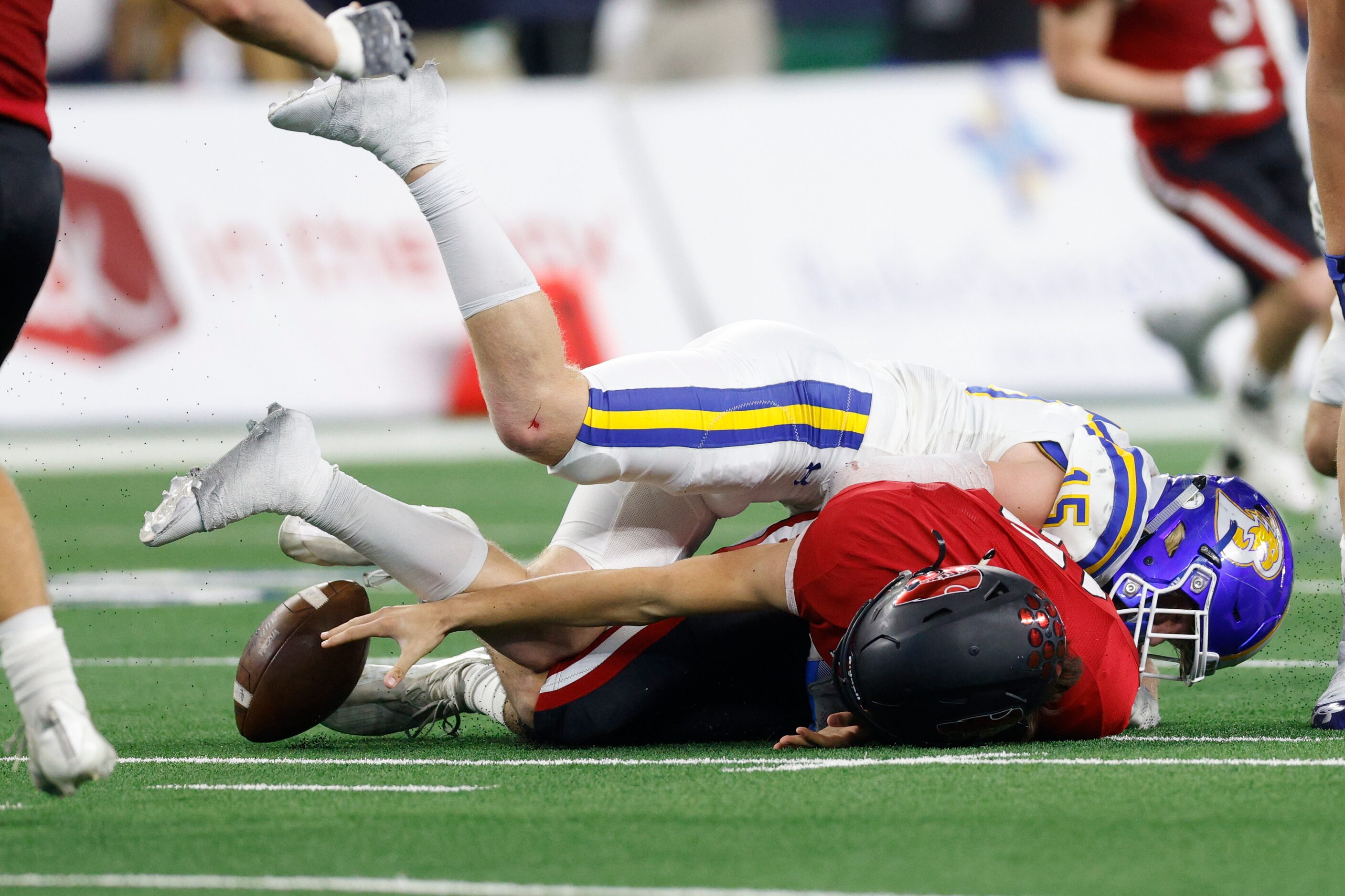 Lorena quarterback Taylor Cargill (12) reaches for the ball after being sacked by Brock...