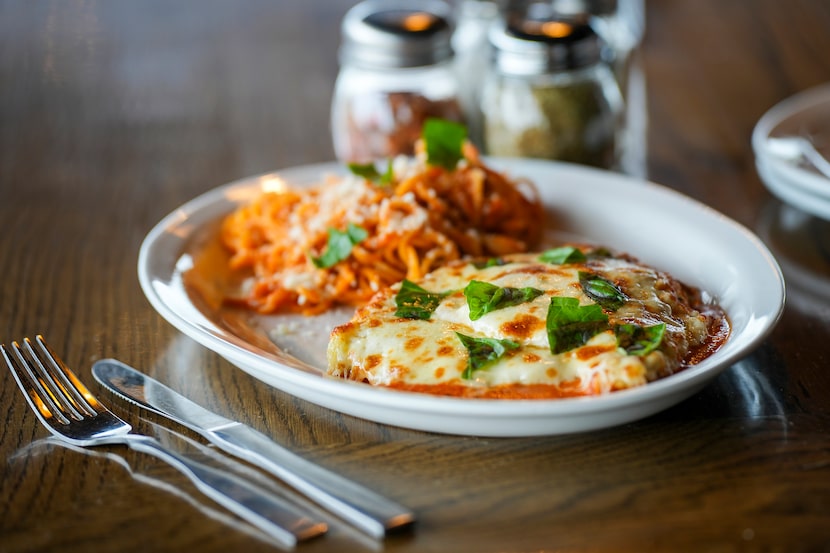 Chicken Parm with housemade spaghetti comes draped with mozzarella at Fortunate Son in Garland.