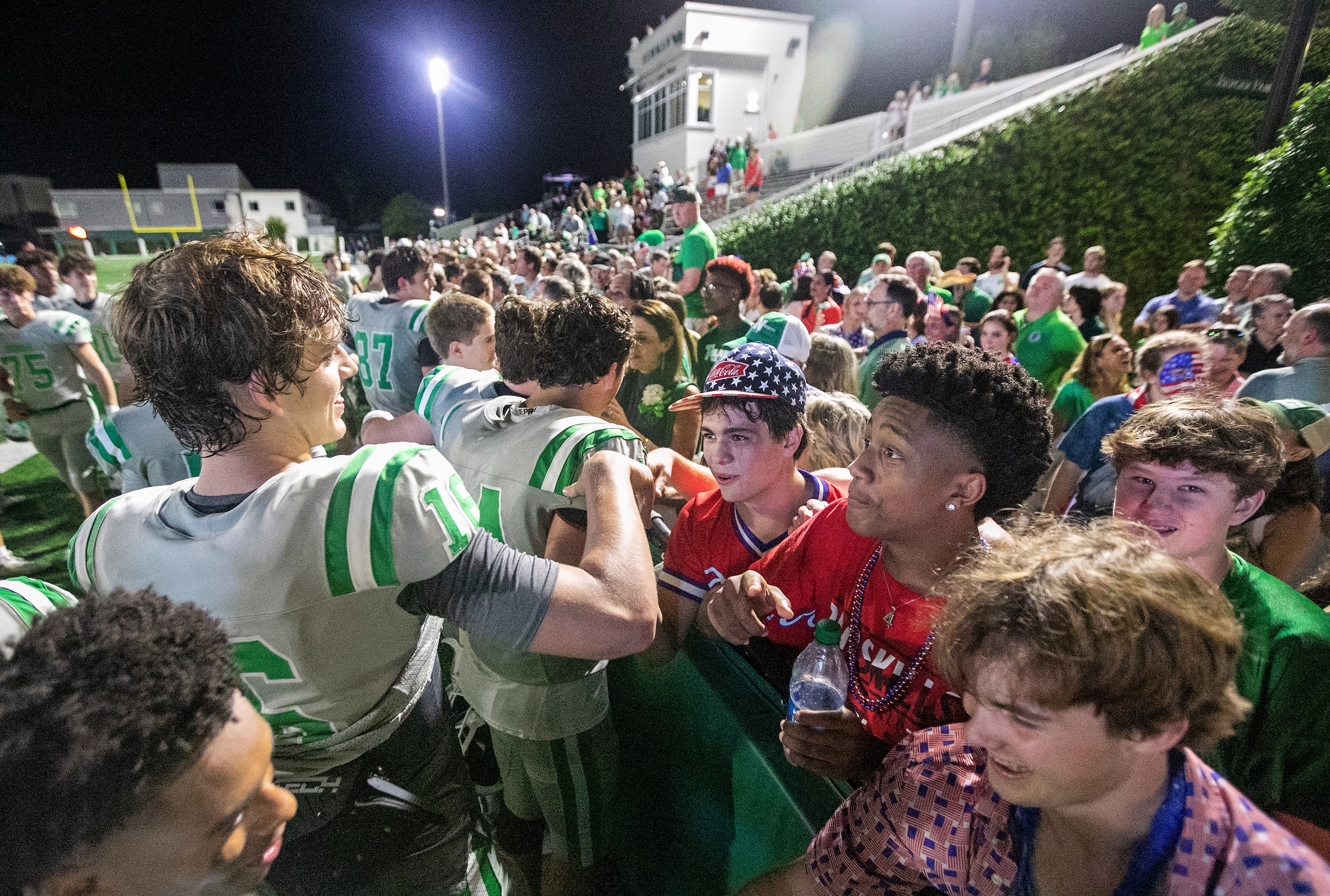 Arch Manning greets his schoolmate fans after Newman High School defeated Riverside Academy...