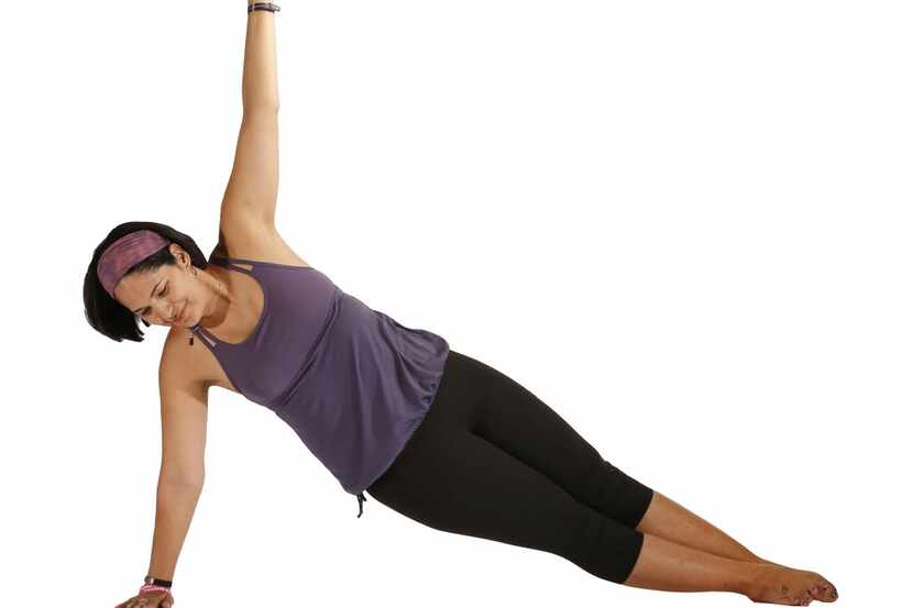 A side plank demonstrated by personal trainer Sylvia Bernal 