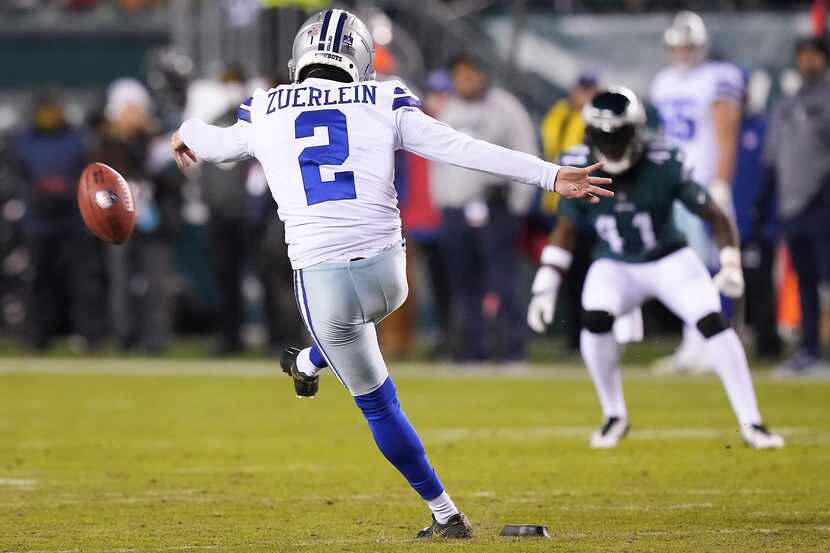 Dallas Cowboys kicker Greg Zuerlein (2) kicks off during the second quarter of an NFL...