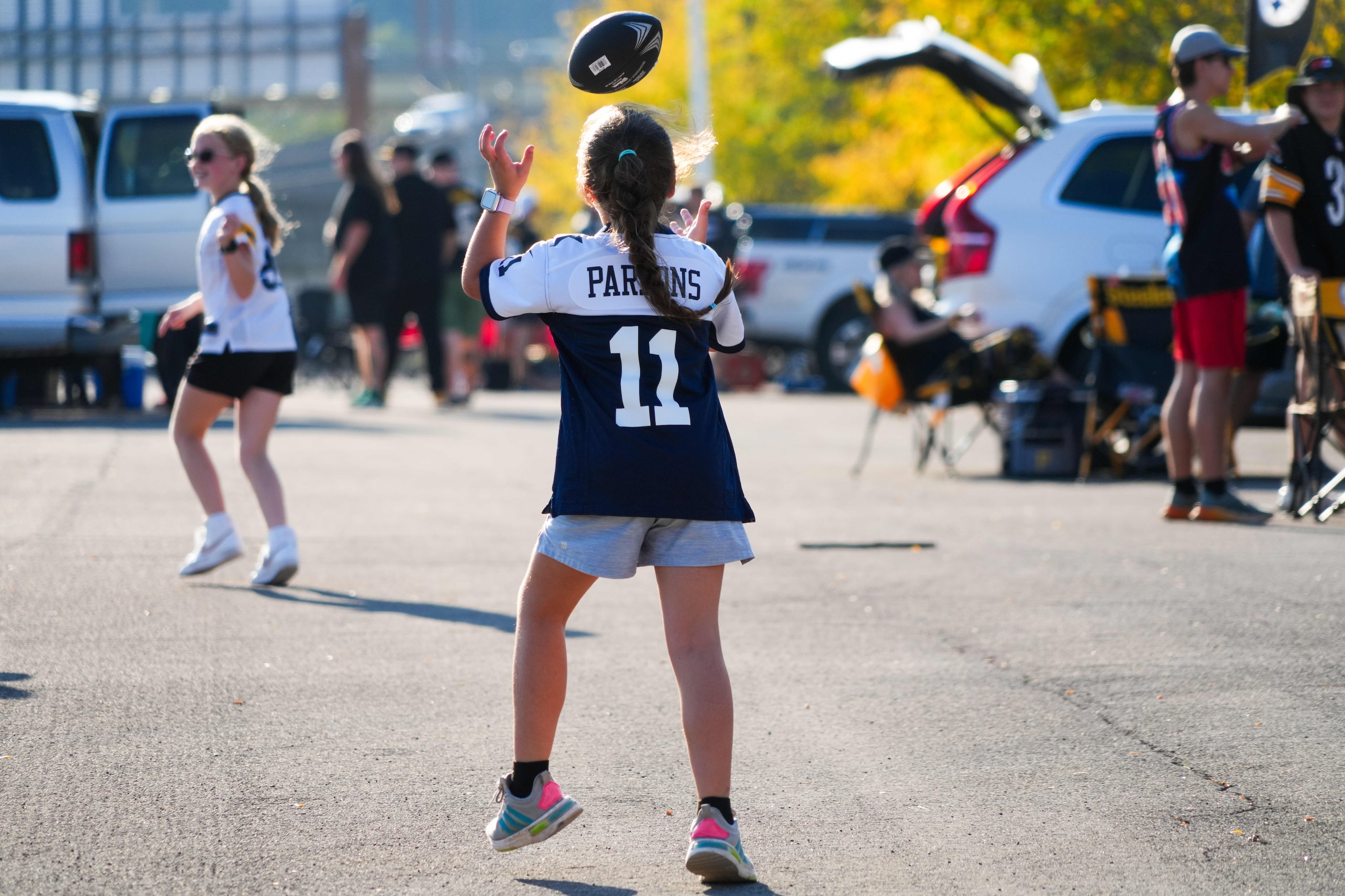 Dallas Cowboys fans tailgate before an NFL football game against the Pittsburgh Steelers on...