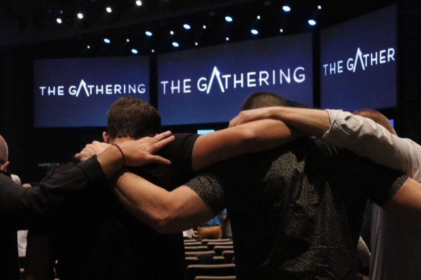 Solemn Assembly Called 'The Gathering' Seeks Nation's Return to God. A group pray for the...