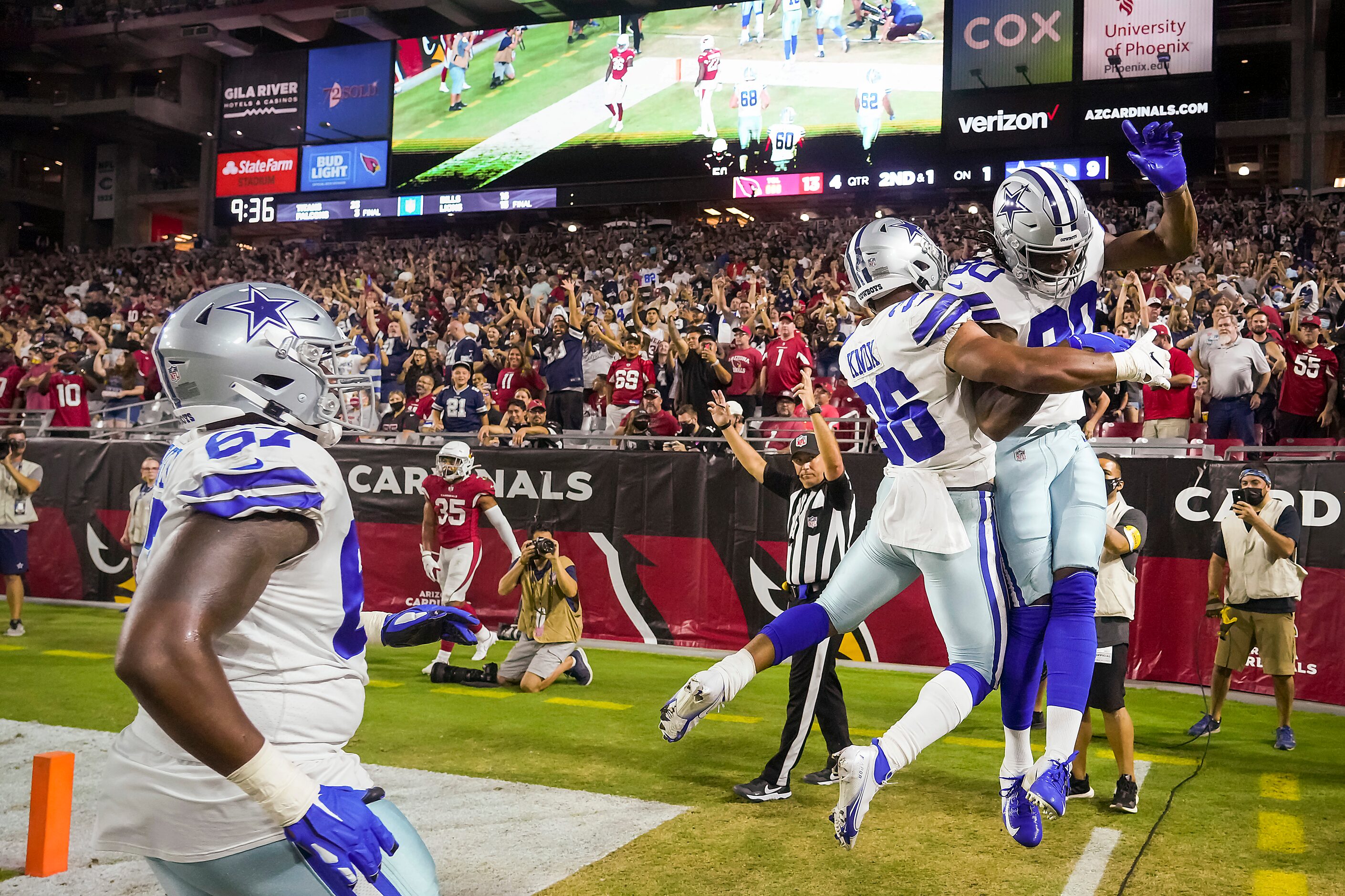 Dallas Cowboys wide receiver Brandon Smith (80) celebrates with running back Brenden Knox...