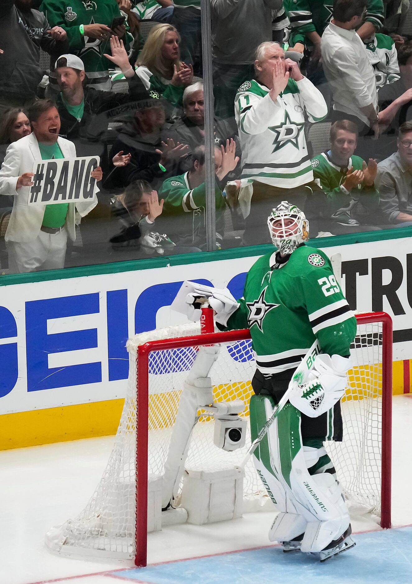 Fans cheer Dallas Stars goaltender Jake Oettinger during the overtime in Game 1 of a...