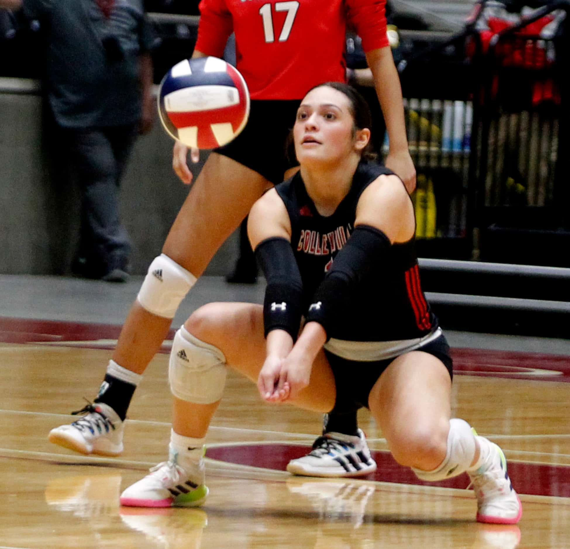 Colleyville Heritage junior Sarah Mendoza (1) digs the ball during the 3rd set of their...