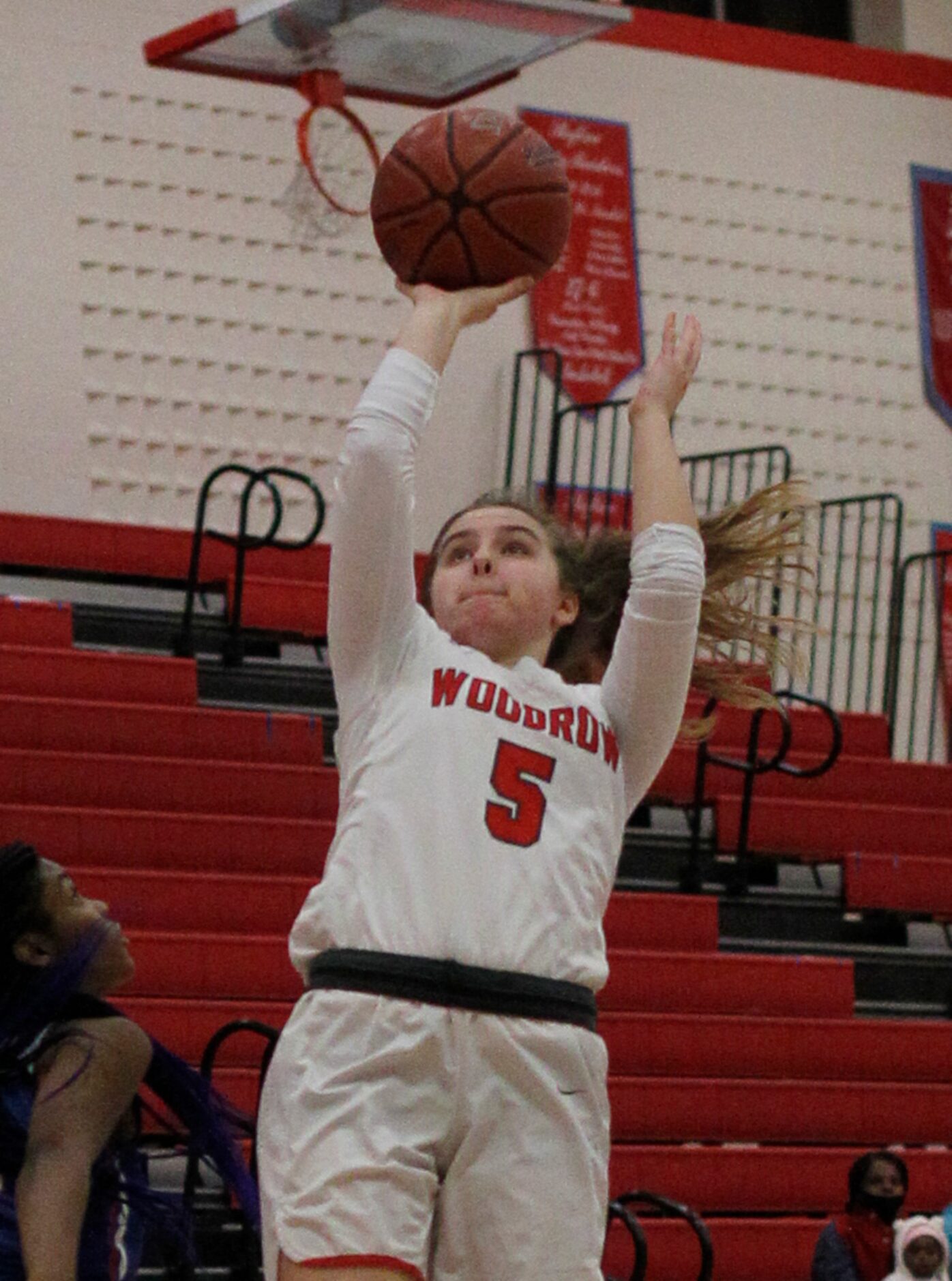 Dallas Woodrow Wilson's Lauren Kintz (5) puts up a shot during first half action against...