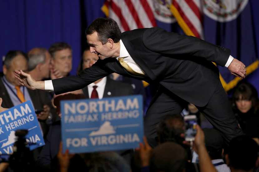 Ralph Northam, the Democratic candidate for governor of Virginia, greets supporters at an...