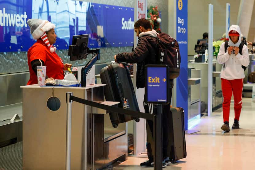 A Southwest Airlines passenger checked his bags at Dallas Love Field Thursday, Dec. 22, 2022.