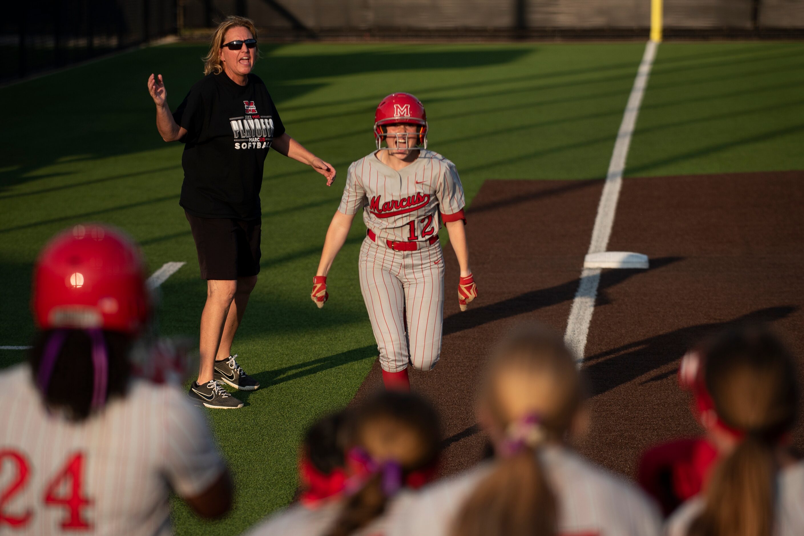 Flower Mound Marcus sophomore Avery Rich (12) runs home after hitting a solo home run during...