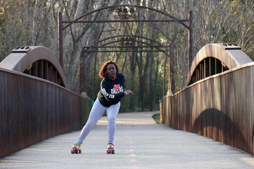 Olivia Aigbogun, chairman of the board of the Dallas Derby Devils, skates at River Legacy...