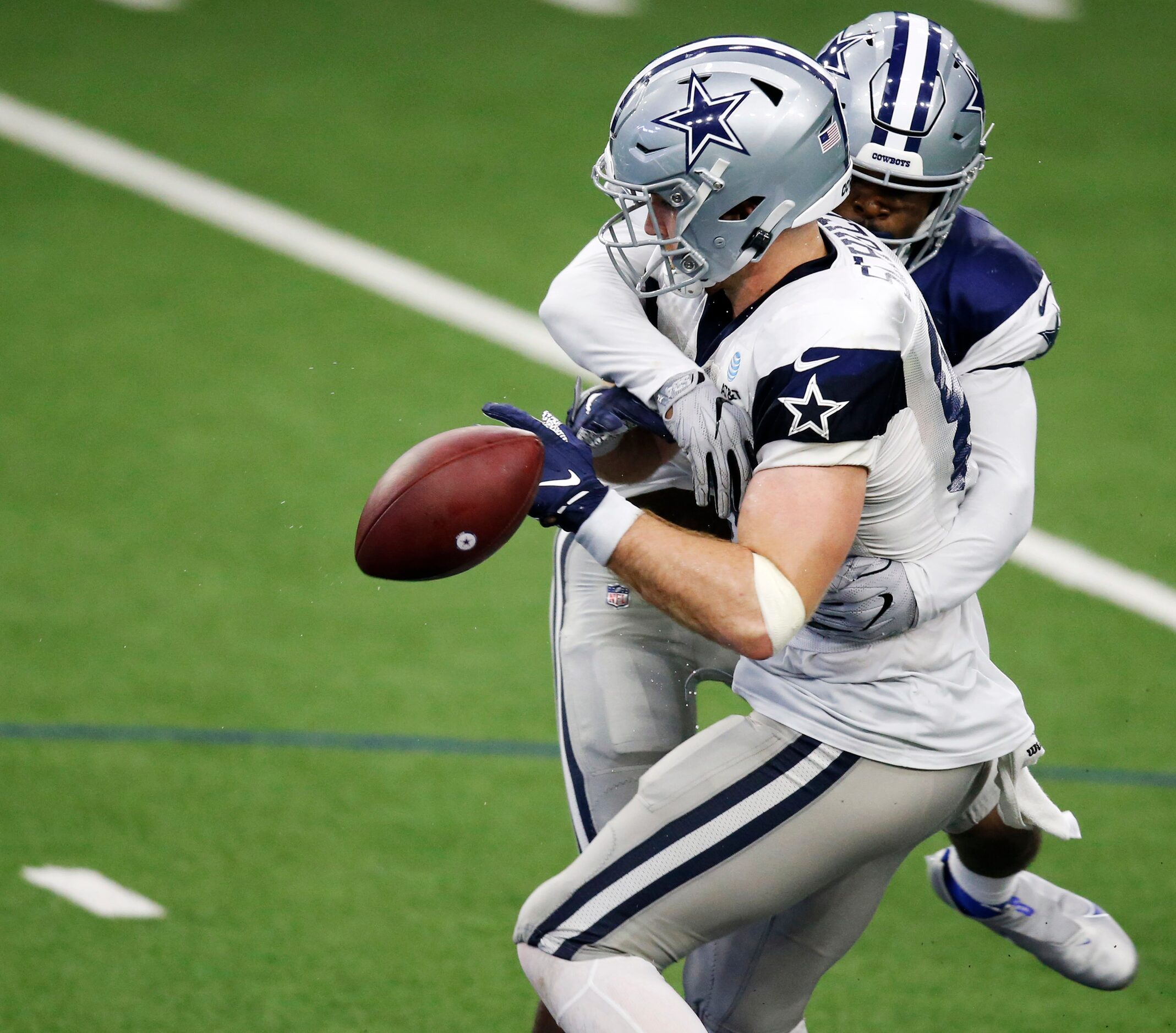 Dallas Cowboys safety Xavier Woods (25) breaks up a pass intended for Dallas Cowboys tight...