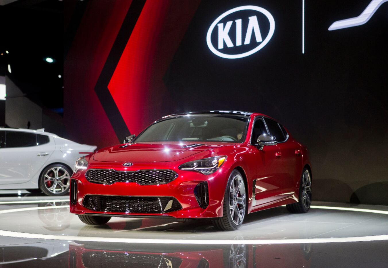 The Kia Stinger sports sedan is unveiled at the North American International Auto Show,...
