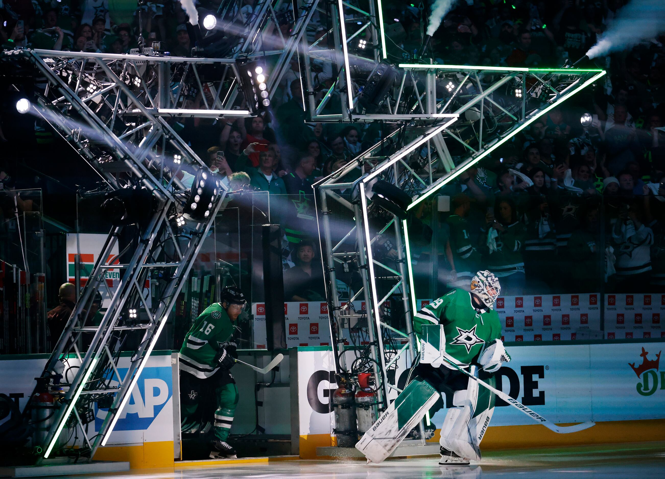 Dallas Stars goaltender Jake Oettinger (29) leads the team in introductions before their...