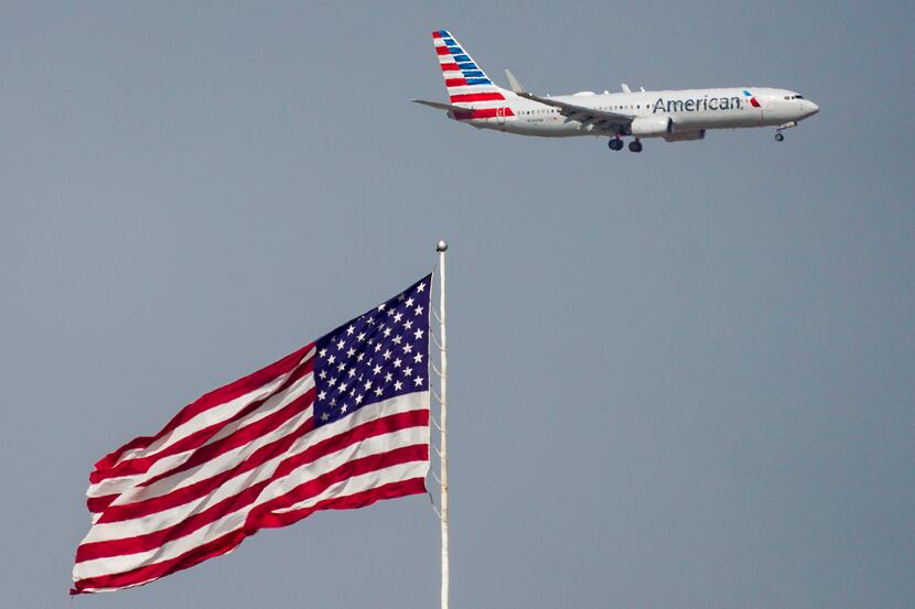 An American Airlines 737 descends for a landing at DFW International Airport.