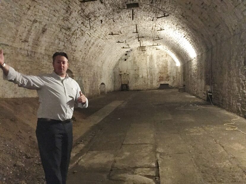 A guide with American Legacy Tours explains the underground cooling and storage system used...