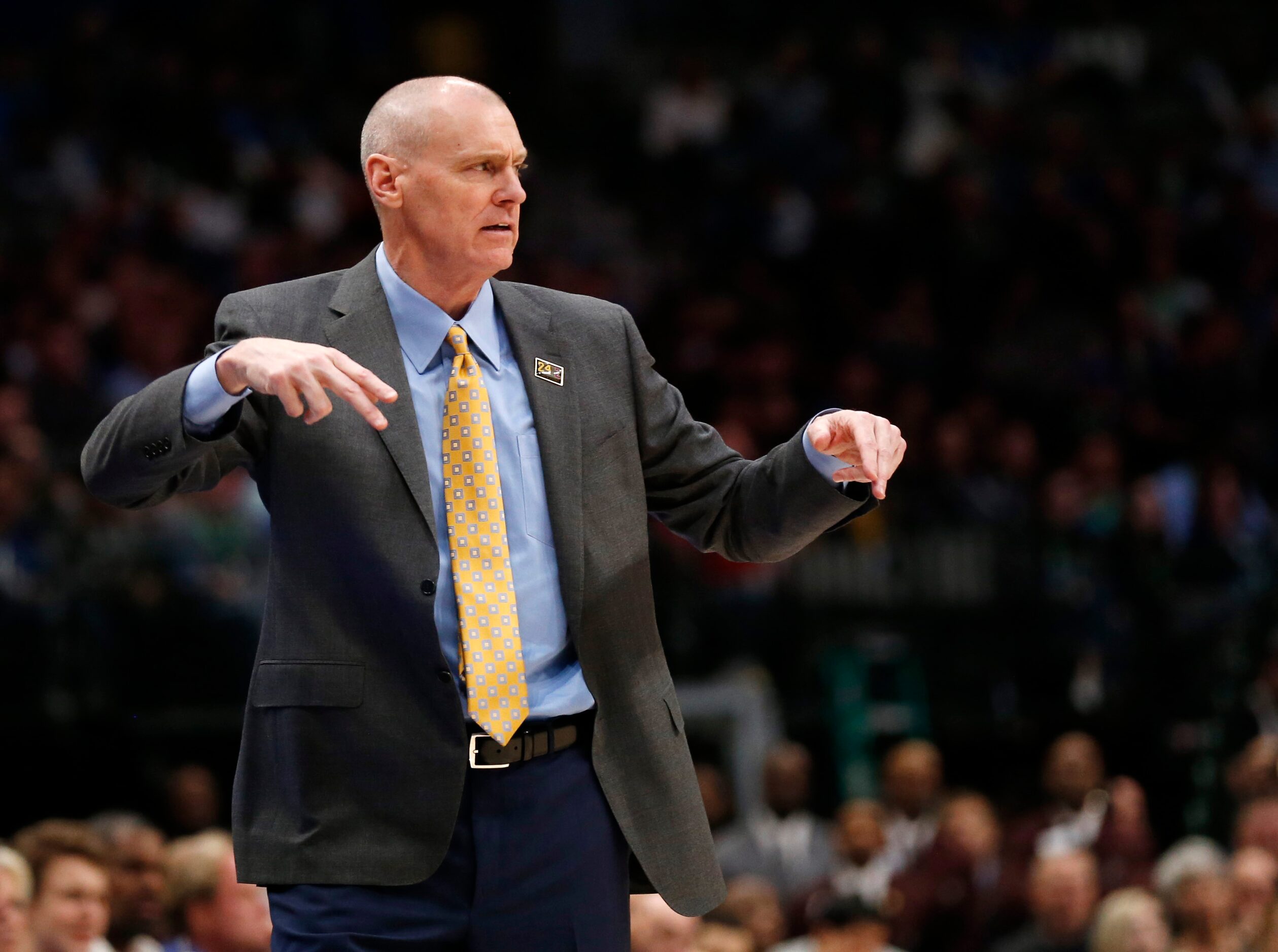 Dallas Mavericks head coach Rick Carlisle communicates to his team during the second half of...