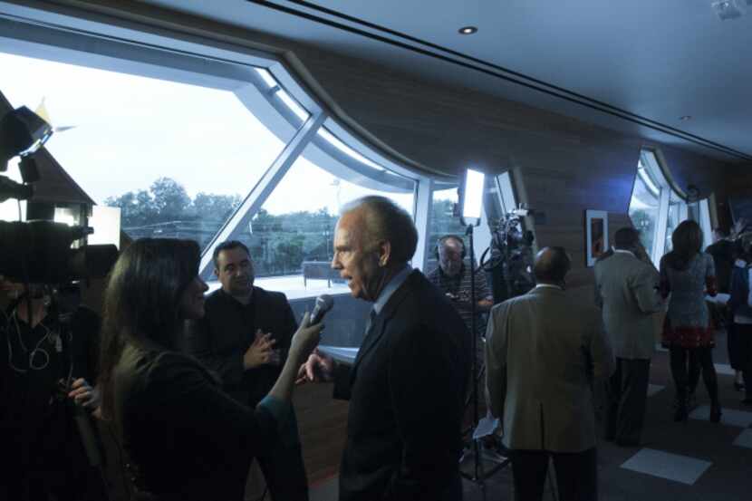 Former Dallas Cowboys quarterback Roger Staubach is interviewed during cocktail reception...