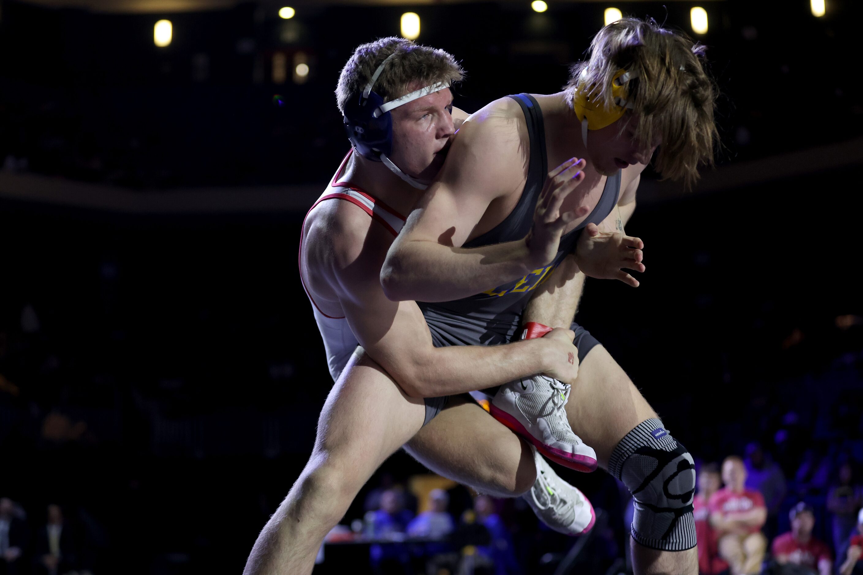 Aiden Cooley of Allen (white) competes against Isaac Sheeran of Klein during the Boys 6A...