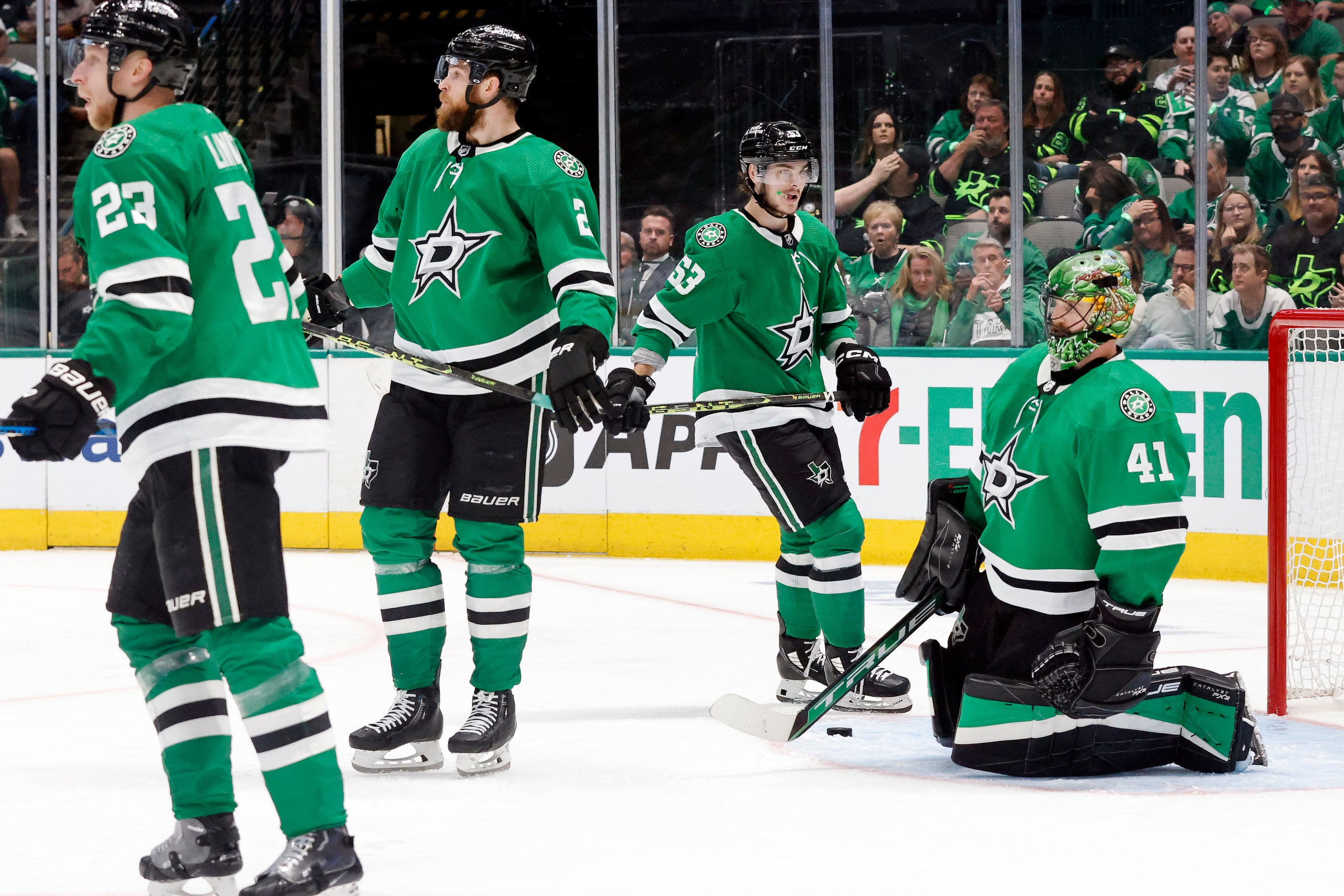 Dallas Stars goaltender Scott Wedgewood (41) kneels in the crease after being scored on by...