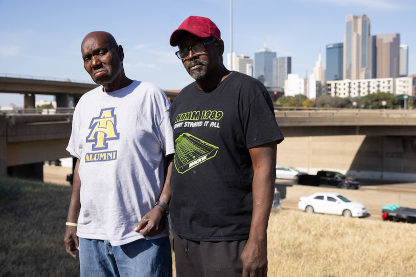 Samuel Jenkins (left) and Robert Watson, who were friends of Kenneth McGlothurn, pose for a...