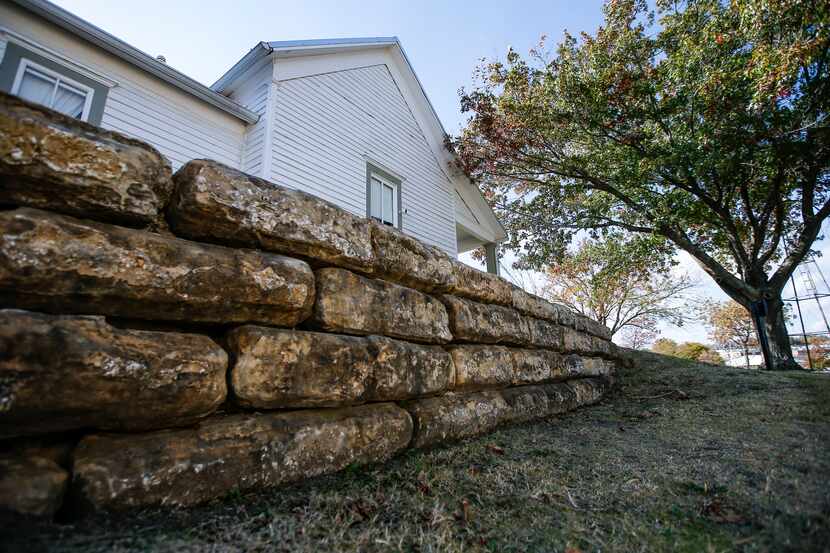 Rocks from the actual Rock Wall are on display at the Rockwall County Historical Foundation....