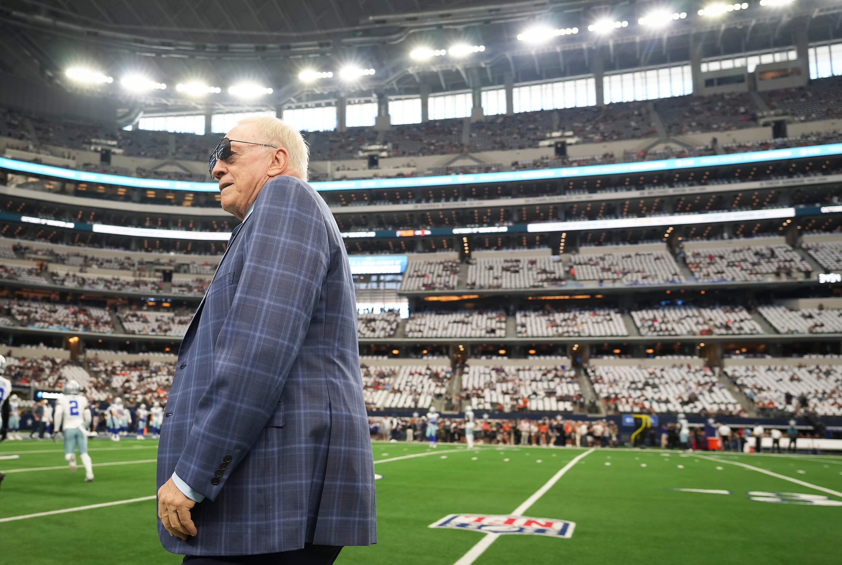 Dallas Cowboys owner and general manager Jerry Jones walks the sidelines  before an NFL...