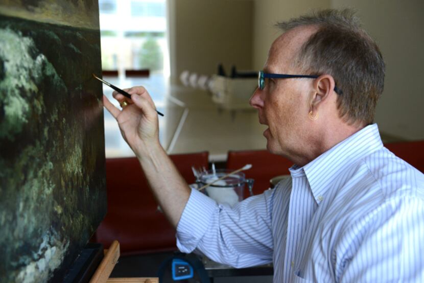 Mark Leonard, Dallas Museum of Art chief conservator, cleans and restores Gustave Courbet's...
