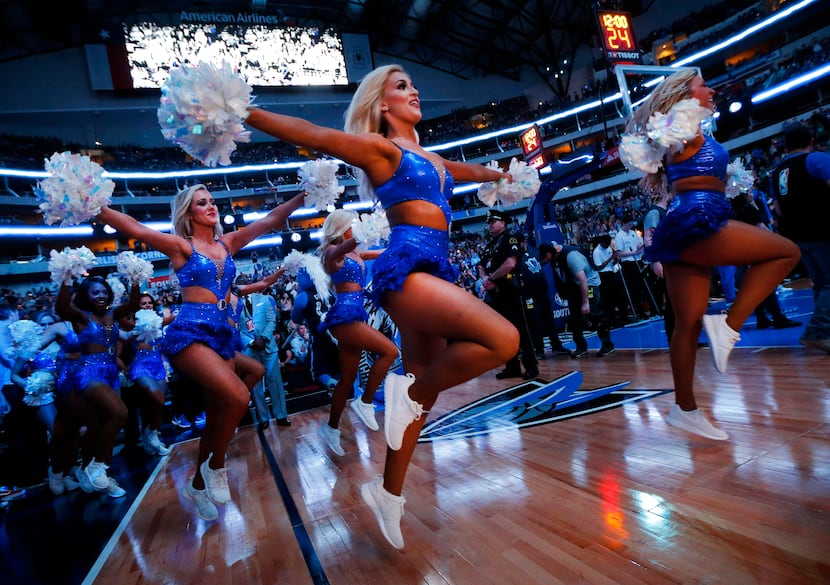 The Dallas Mavericks Dancers skipped onto the court for player introductions before the team...