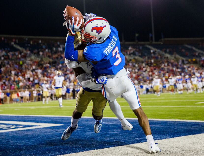 SMU Mustangs wide receiver James Proche (3) catches a pass in the end zone for a 43-37 win...