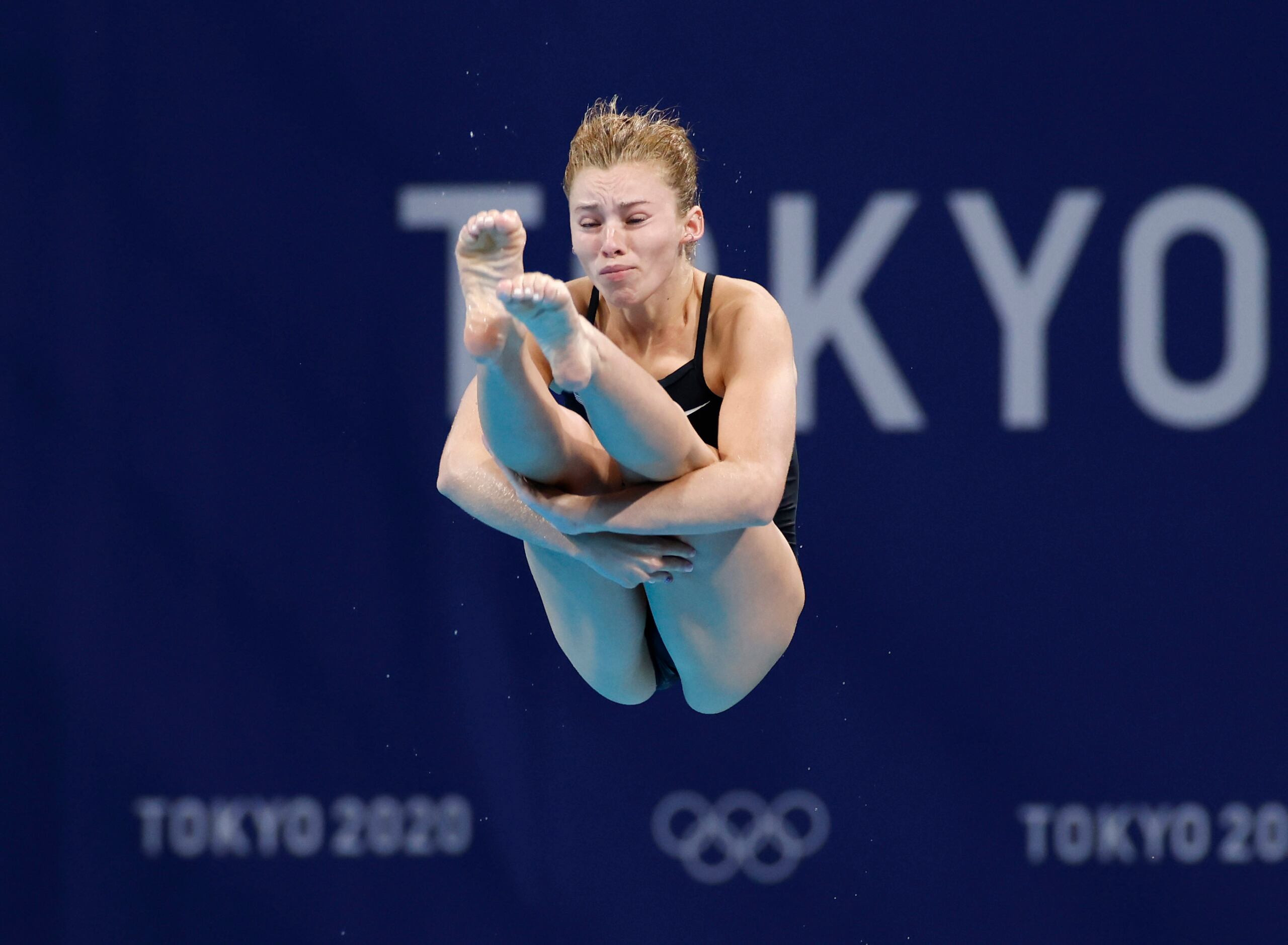 USA’s Hailey Hernandez dives in round 5 of 5 in the women’s 3 meter springboard semifinal...