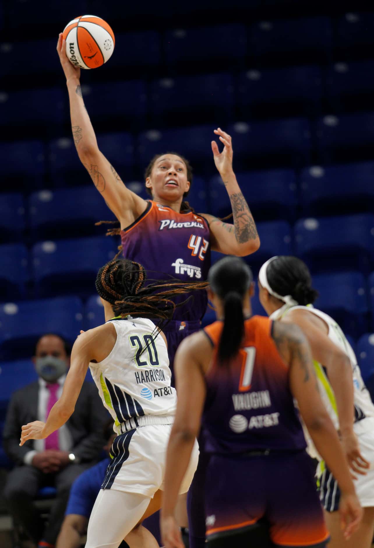 Phoenix forward Brittney Griner (42) skies above all others as she pulls in a lob pass...