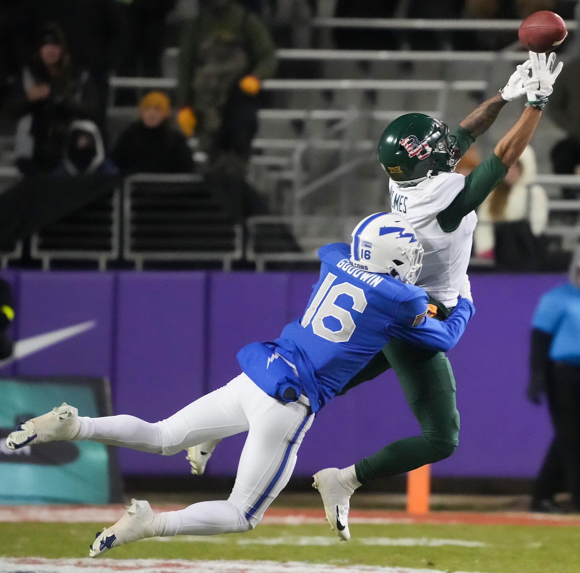 Baylor wide receiver Gavin Holmes (6) can’t make a catch as Air Force safety Jayden Goodwin...