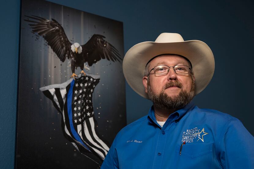 Lt. Johnny Rose poses for a portrait at the Hood County Sheriff’s Office in Granbury, Texas,...