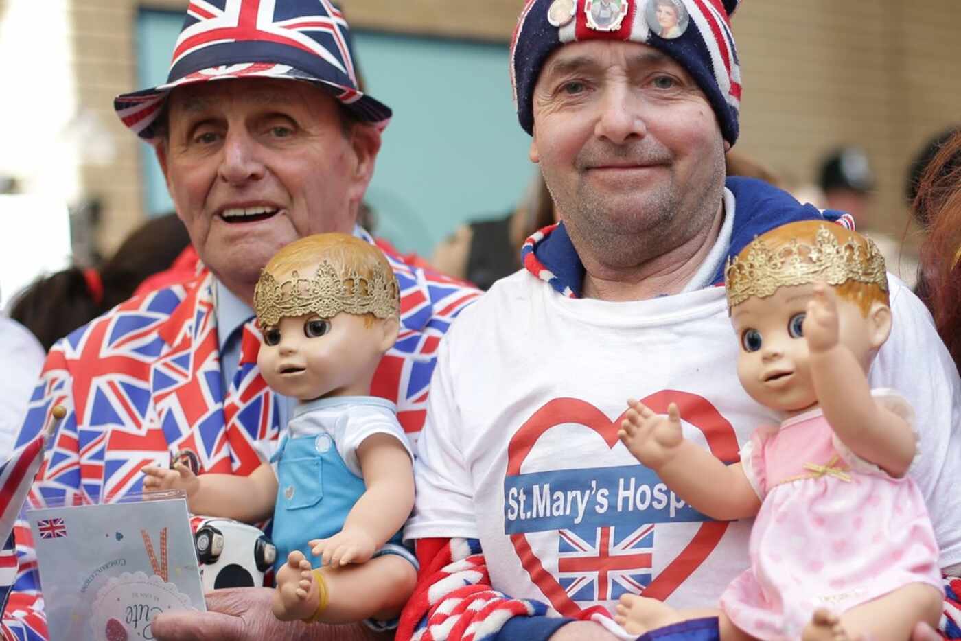 Royal fans pose outside the private Lindo Wing of St Mary's Hospital, in central London.