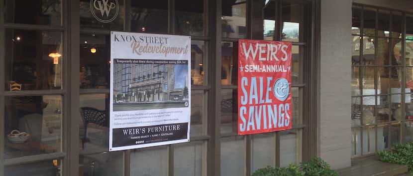 Signs on the windows of Weir's Knox Street store tell customers about the pending shutdown.