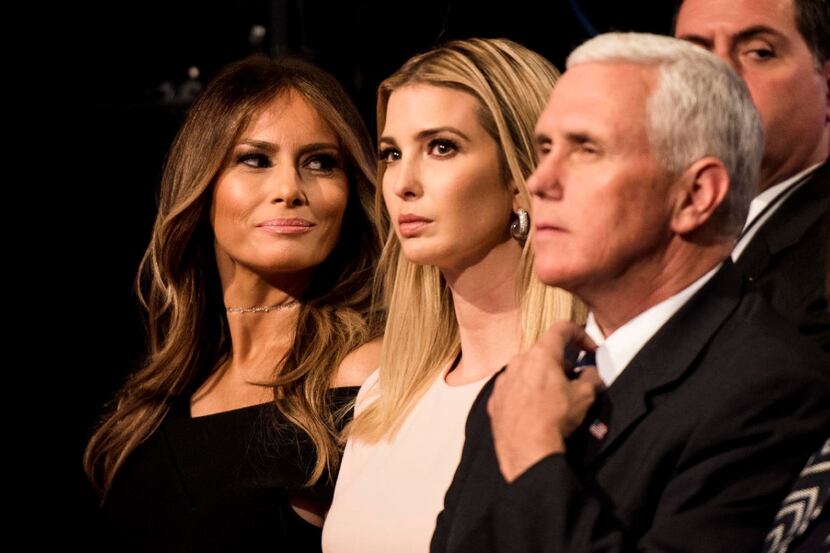 Melania Trump sits with Ivanka Trump, along with Republican vice presidential nominee Mike...