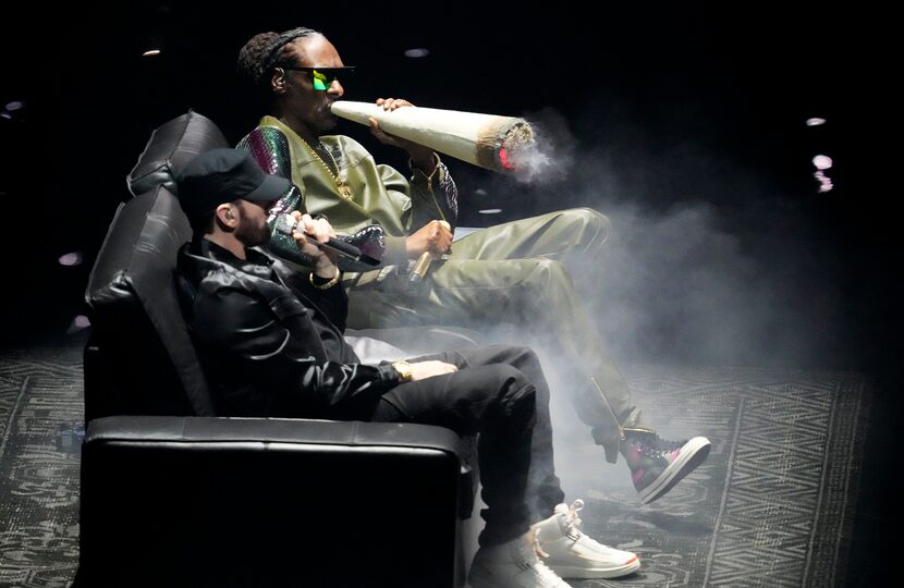 Eminem, foreground, and Snoop Dogg perform "From the D 2 the LBC" at the MTV Video Music...