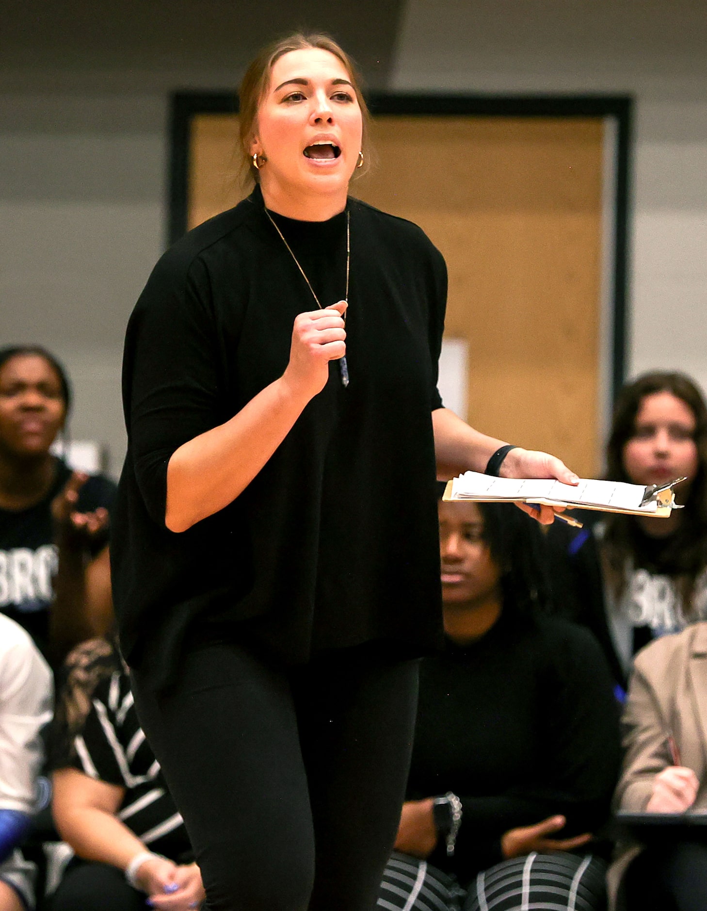 Hebron head coach Rachel Buckley tries to cheer on her team against Southlake Carroll during...