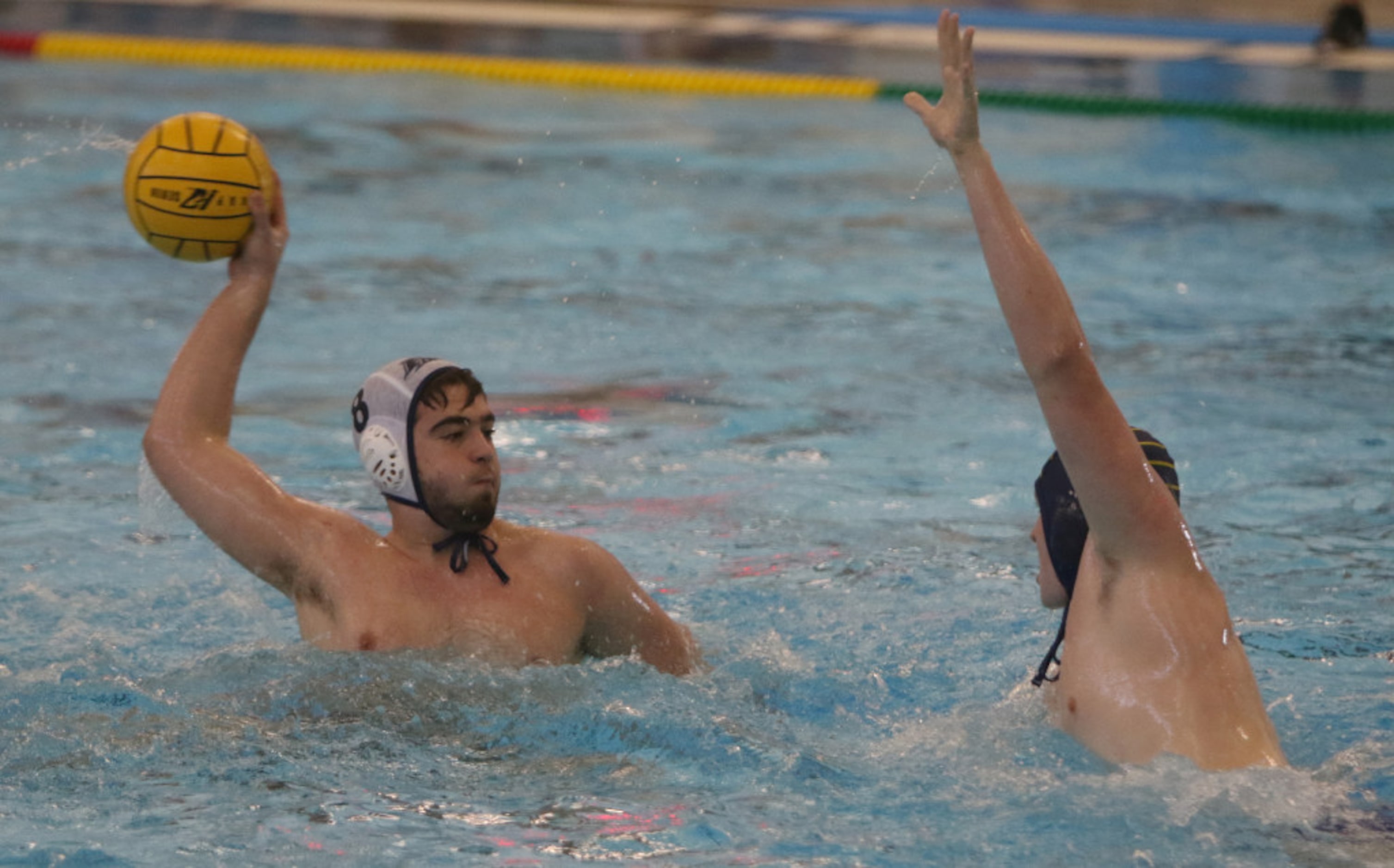 Flower Mound's Alex Rodriguez (8) looks to shoot over the defense of St Mark's defender...