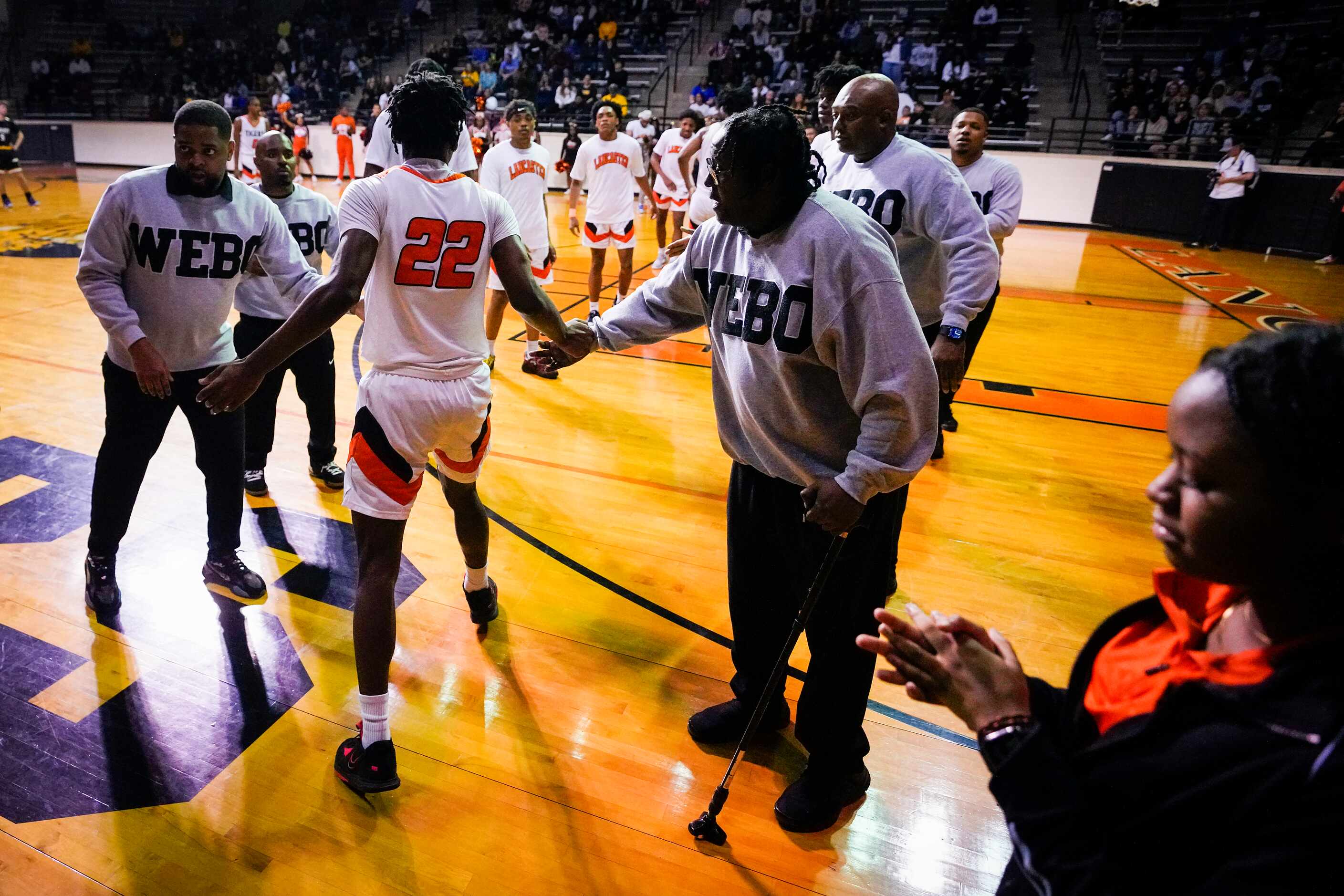 Lancaster's Jordan Williams (22) takes the court for a boys high school basketball game...