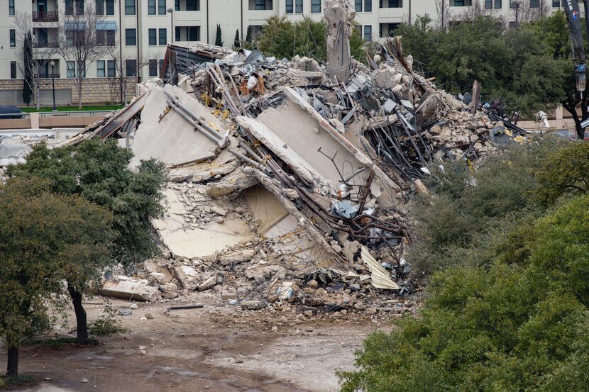 The remains of the Affiliated Computer Services building, or the Leaning to Tower of Dallas,...