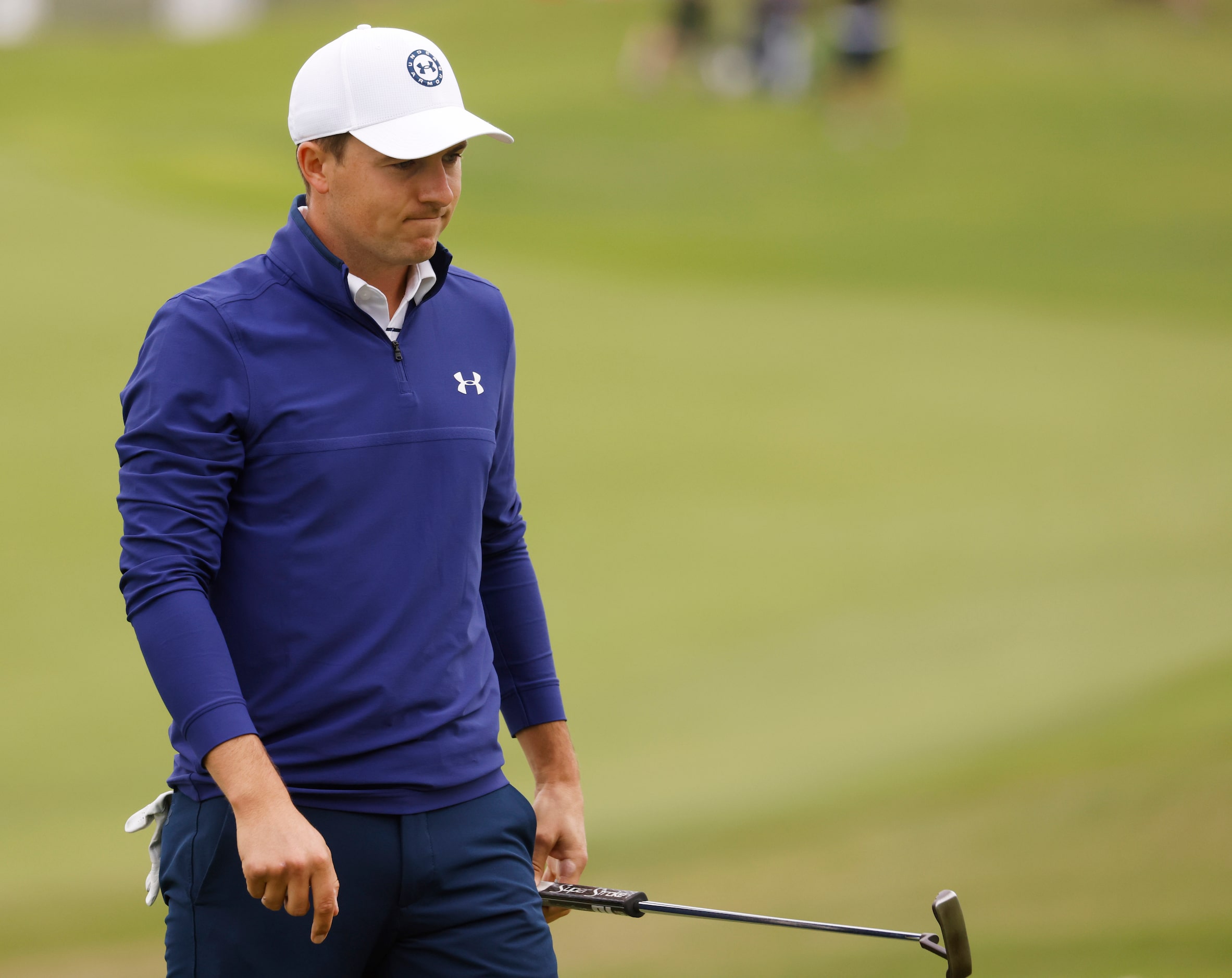 Jordan Spieth reacts after finishing up on the 18th hole during round 2 of the AT&T Byron...