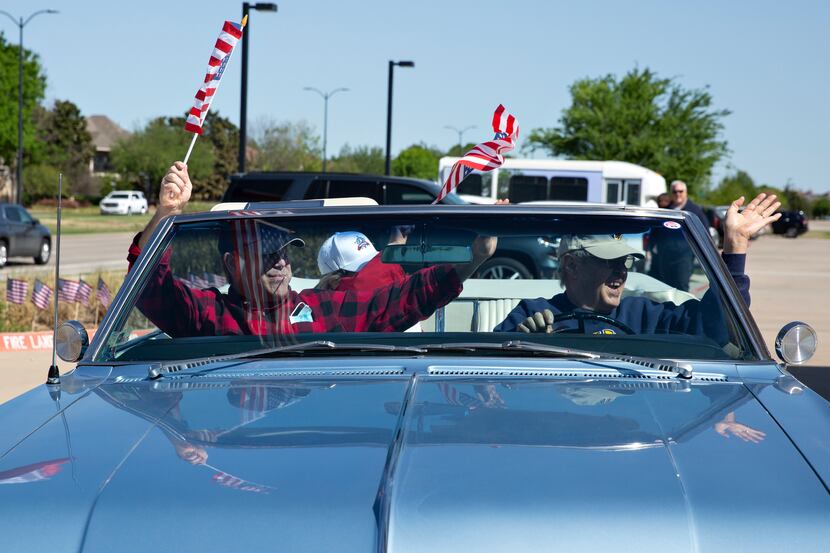 People decked out their vehicles with flags, streamers, balloons and signs for the parade.