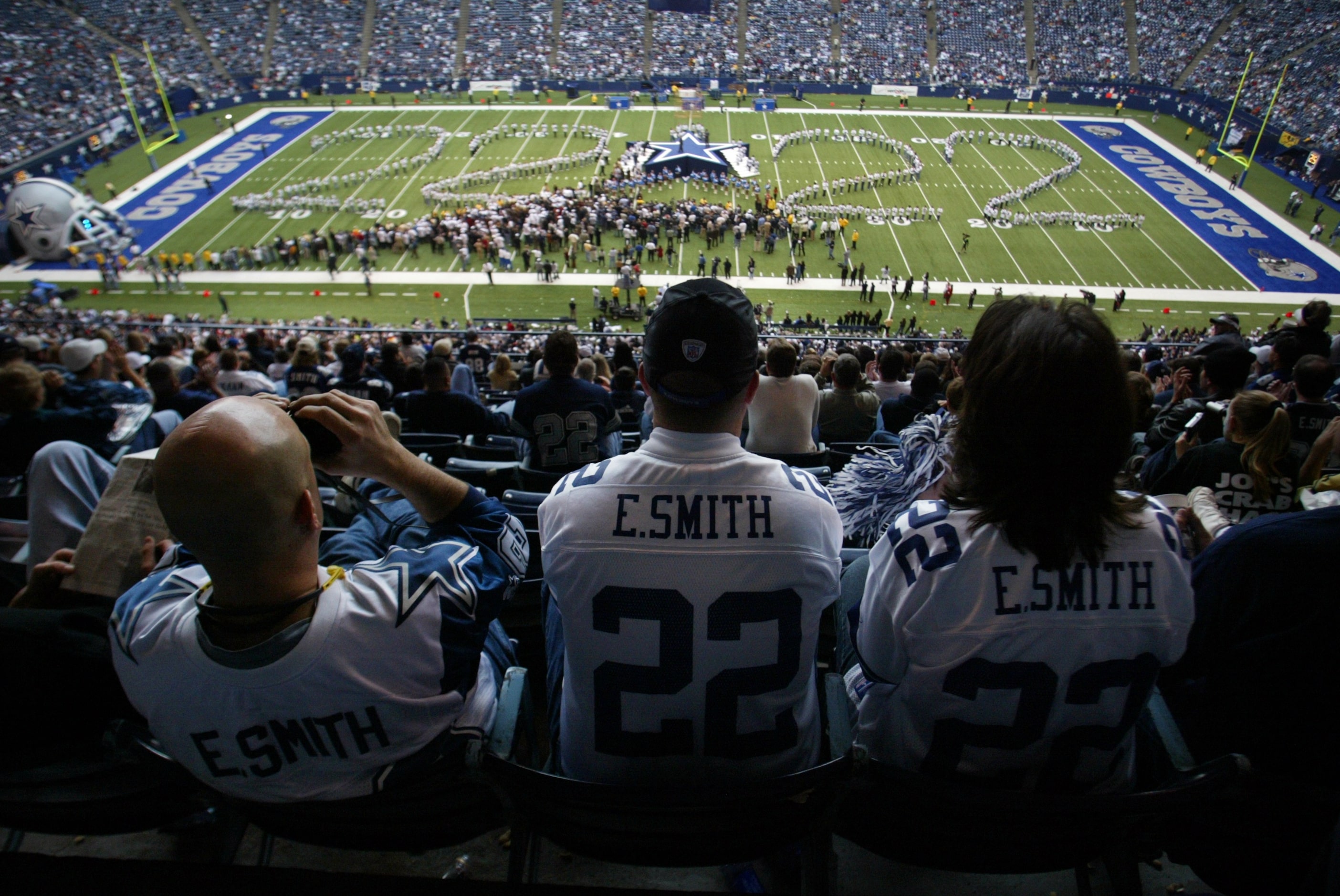 Cowboys fans David Roehrig, of Garland, left, and Mark and Sherrie Carlson, of Ft. Worth,...