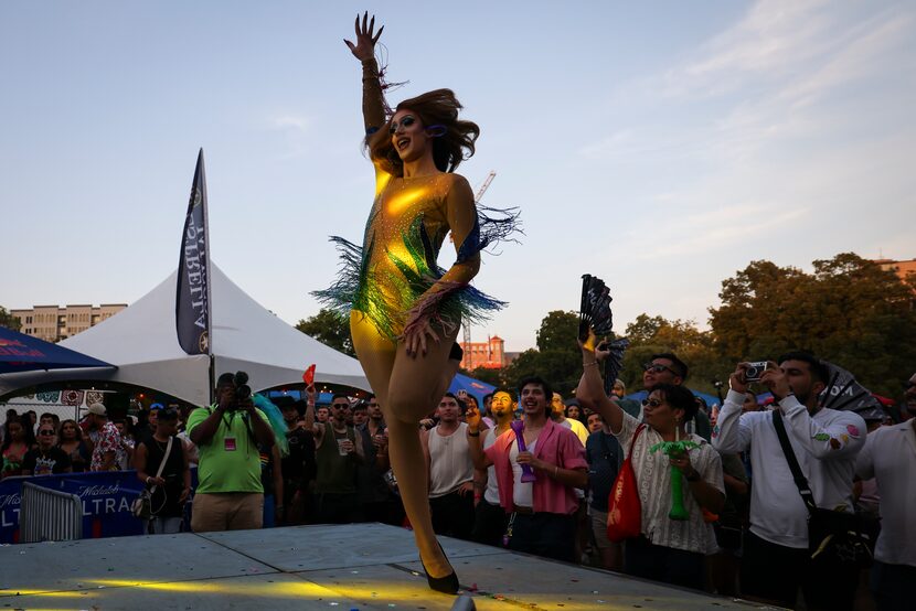 Mary Con dances on stage as the crowd cheers on during the festival. 