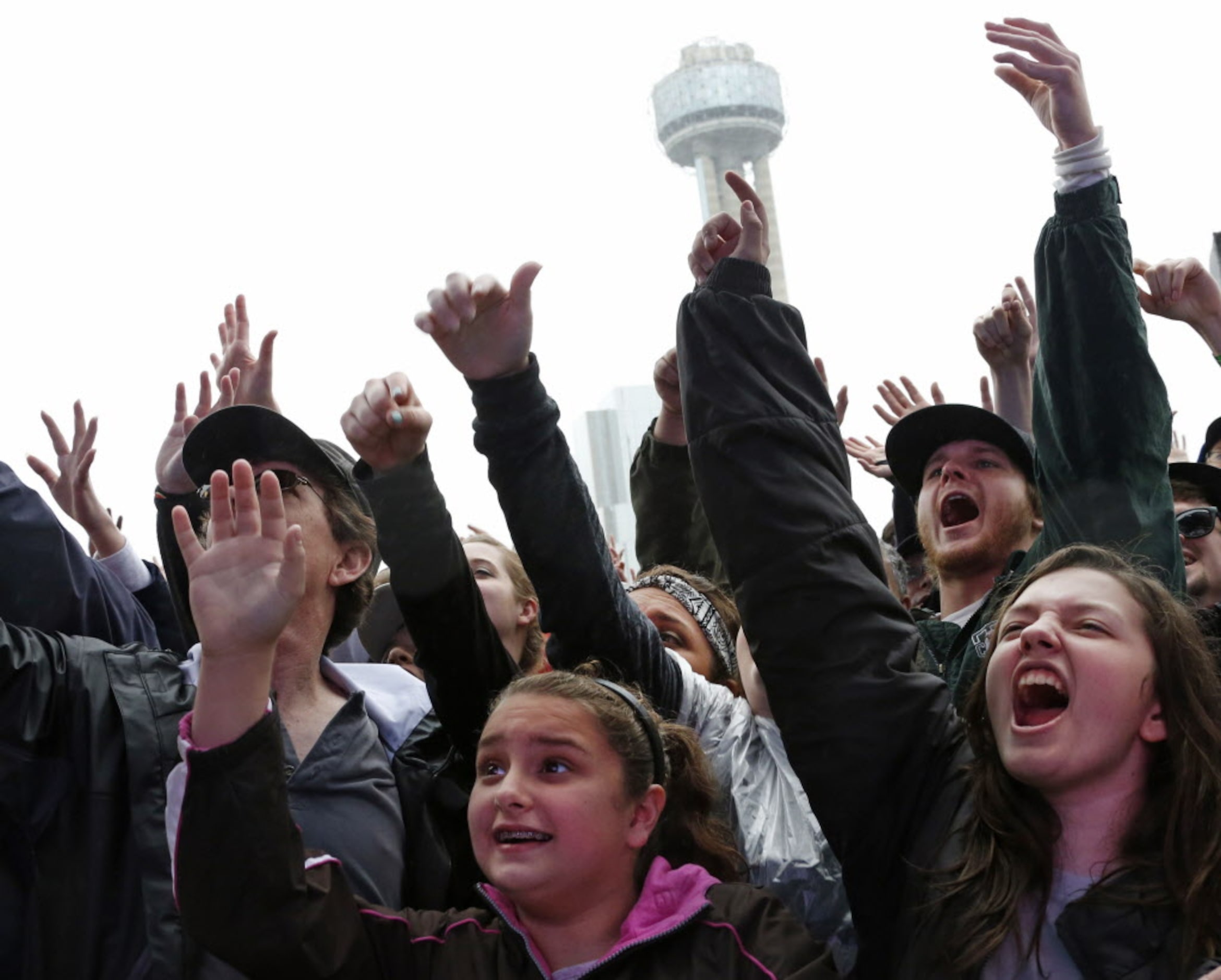 Fans get fired up for the band Fun. before their performance during the March Madness Music...